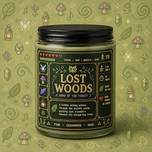 Forest green fantasy-inspired candle in a clear glass jar with a retro pixel adventure game style label reading Lost Woods. Features glowing wood wick flame, woodland icons, and cozy forest aesthetic background.