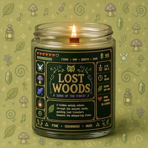 Forest green fantasy-inspired candle in a clear glass jar with a retro pixel adventure game style label reading Lost Woods. Features glowing wood wick flame, woodland icons, and cozy forest aesthetic background.