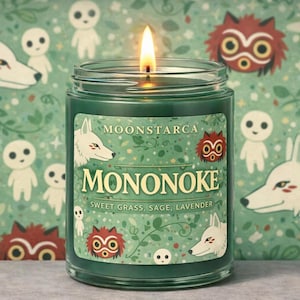 May include: A burning green glass candle jar with the word "MONONOKE" and the scent description on the label. The background features a pattern of white wolves, forest spirits, and red-masked creatures on a green background.