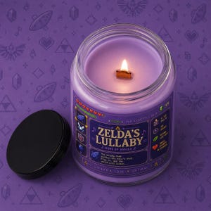 Purple fantasy-inspired candle in a clear glass jar with a retro pixel game style label reading Zelda’s Lullaby. Features glowing wood wick flame, lavender wax, black lid beside the candle, and cozy purple pixel background.