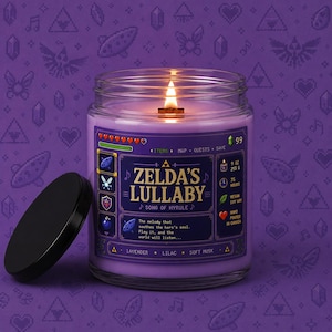 Purple fantasy-inspired candle in a clear glass jar with a retro pixel game style label reading Zelda’s Lullaby. Features glowing wood wick flame, lavender wax, black lid beside the candle, and cozy purple pixel background.