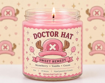 Pink aesthetic soy candle in 8oz glass jar with “Doctor Hat” label, featuring cute hat and antler design, wood wick flame, OP inspired