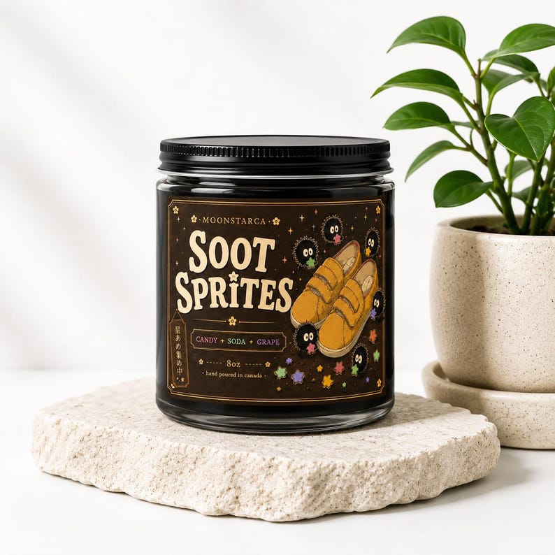 Soot Sprites soy candle with cute black sprite artwork and brown label