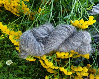 100% natural yarn of musk ox fiber, Country-style yarn. Qiviut  - not coloured, harvested in Arctic Tundra. One ounce per piece.