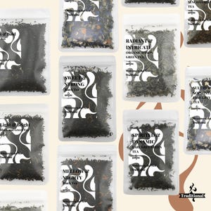 May include: Assortment of loose leaf tea bags in clear pouches with black and white text and designs. The tea flavors include: Bold & Tea, Light & Bright, Sweet & Strong, Radiant & Intricate, Spirited & Dynamic, Mellow & Mighty, Sultry & Sophisticated, and Sencha Green Tea.