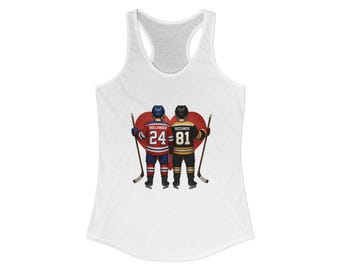 May include: White racerback tank top featuring a graphic of two hockey players in jerseys with the numbers 24 and 81, standing in front of a red heart. The players are holding hockey sticks.