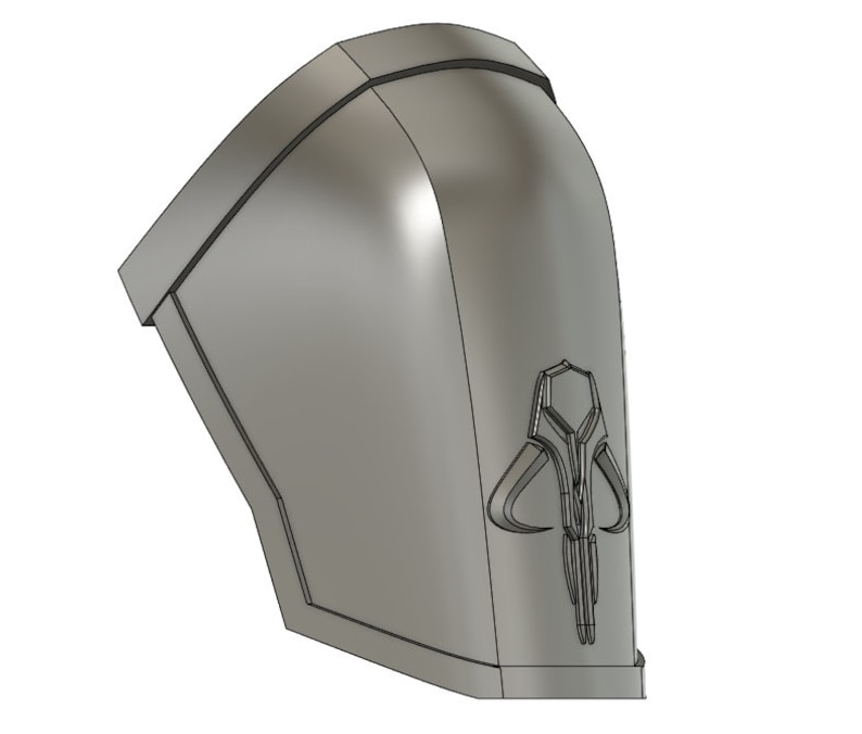 May include: A gray 3D printed Mandalorian symbol, also known as the "Cuy'ar", is a symbol of the Mandalorian culture. The symbol is a stylized representation of a mythosaur skull.