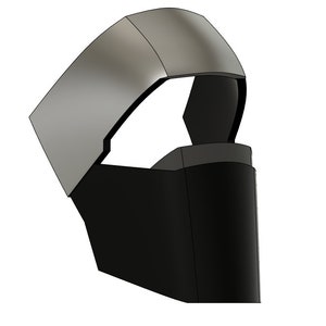 May include: A black and silver face mask with a curved, helmet-like top. The mask has a large opening for the eyes and nose.