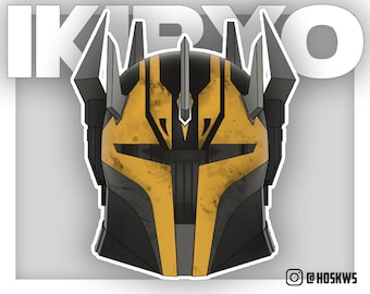 May include: A black and yellow helmet with a pointed crown and horns. The helmet has a weathered, distressed look.