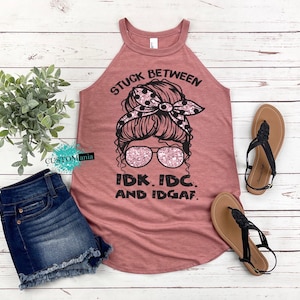 Stuck Between Idk Idc and Idgaf District  Women’s Perfect Tri Rocker Tank