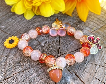 Bracelet d'automne | Bracelet de perles tournesol, gland et papillon | Bijou d'automne fait main | Cadeau nature pour elle
