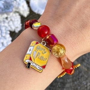 Harry Potter Bracelet | Gryffindor House Bracelet | Harry Potter Gryffindor Charm | Book and Golden Snitch Charm Bracelet | HP Fan Jewelry