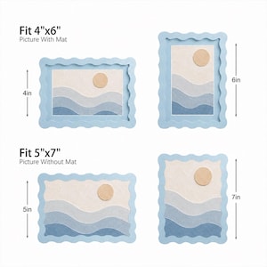 May include: Four light blue picture frames with wavy edges, displaying a layered paper art scene of a tan sun over blue ocean waves. The frames are labeled to fit 4-inch by 6-inch pictures with a mat and 5-inch by 7-inch pictures without a mat.