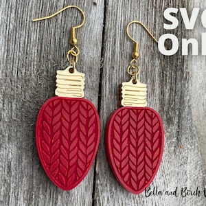 May include: A pair of red knitted lightbulb earrings with gold tops. SVG Only.