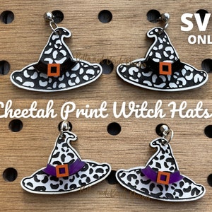May include: SVG cut files for cheetah print witch hat earrings. The hats are black and white with orange and purple accents. SVG ONLY.