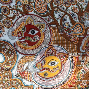 A quilt or bed spread is made up of this art in nice bohemian style with blend of Nordic Scandinavian style.
