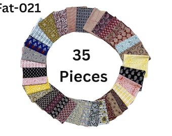 May include: A collection of 35 fabric squares in various colors and patterns, including red, blue, green, yellow, and brown. The squares are arranged in a circle, with the text "Fat-021" and "35 Pieces" visible in the center.