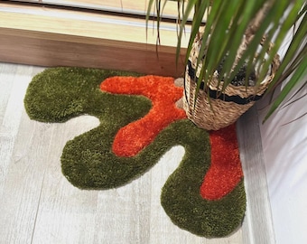 Alfombra de esquina con mechones hechos a mano: decoración bohemia abstracta en tonos oliva y naranja