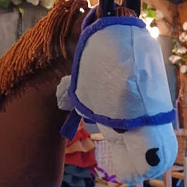 Adjustable hobby horse fly mask