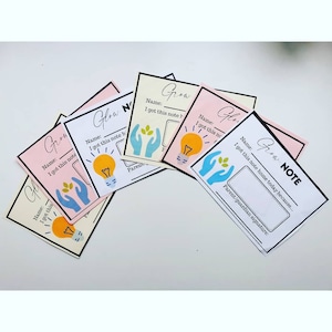 May include: A set of five colourful cards with the words "Grow" and "Glow" printed on them. Each card has a light bulb and a pair of hands holding a green leaf. The cards are designed to be used as positive reinforcement notes for children.
