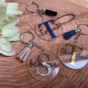 Personalized key ring made of acrylic with a tassel / letter and desired name