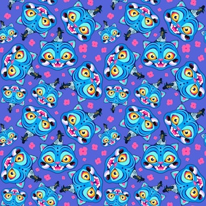 May include: A repeating pattern featuring blue cat faces with yellow eyes and pink mouths on a purple backdrop. The cats have black and white striped markings. Small pink flowers and black bat-like shapes are scattered across the design.