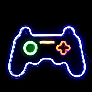 May include: A neon blue video game controller sign with a green circle button and a pink plus button.