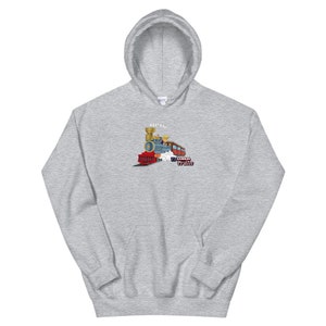 May include: A gray hoodie with a cartoon image of a train engine with the text "Westward Bound Train" printed on the front.
