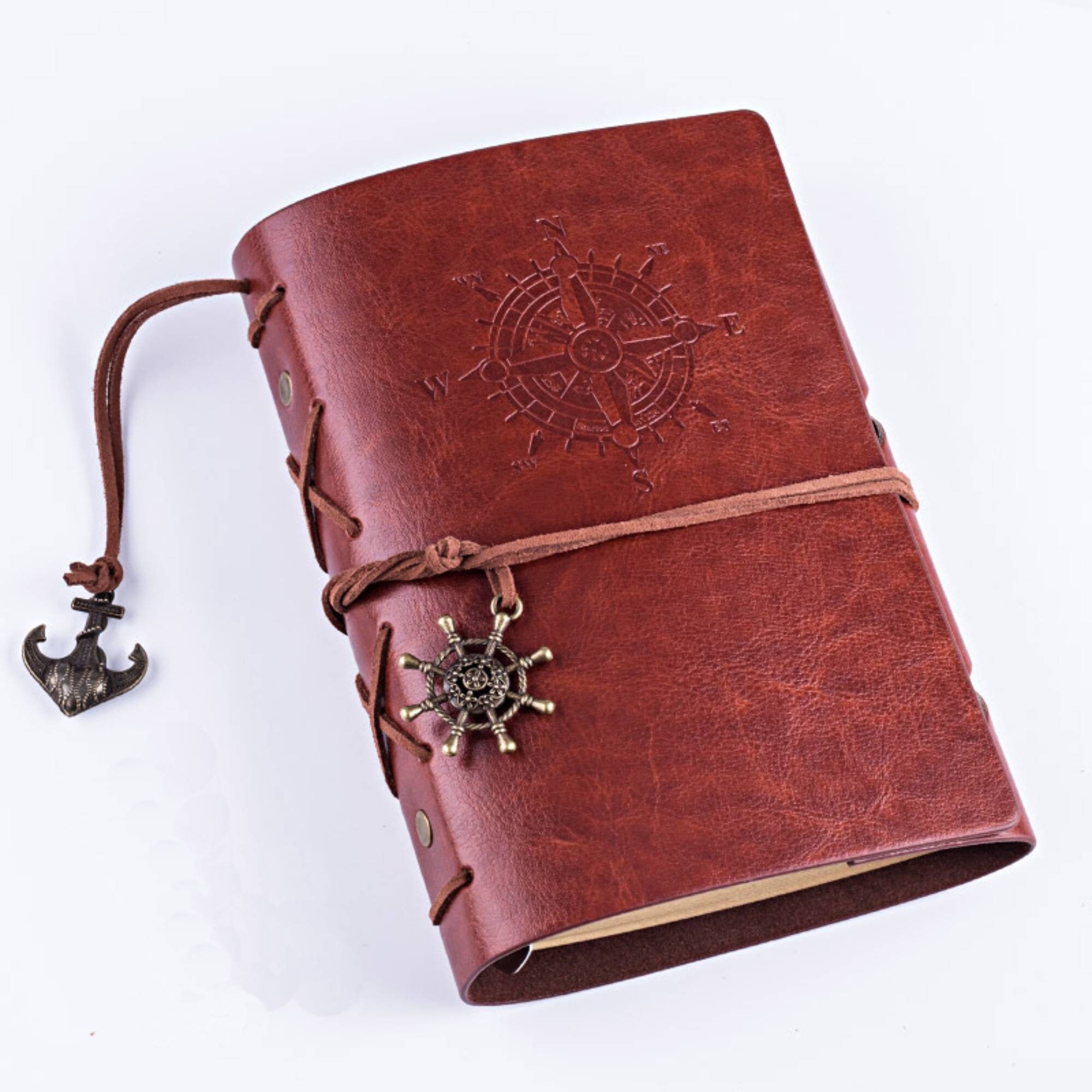 leather travel journal compass