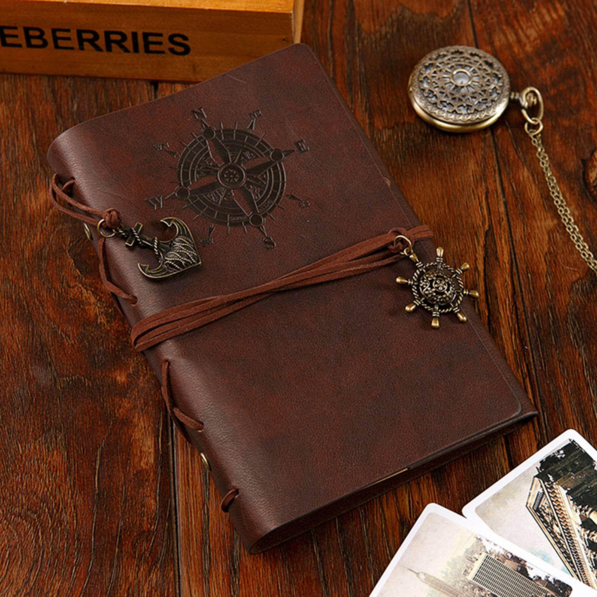 leather travel journal compass