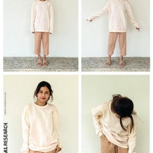 May include: A four-panel image showing a person in a light beige sweatshirt and matching trousers. The sweatshirt has a crew neck and ribbed cuffs. The trousers are cropped. The text "the SWEAT-SHIRT" is at the top.