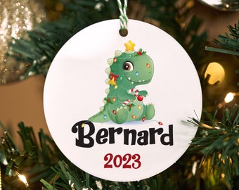 Pour le premier Noël de bébé ! Décorations de Noël personnalisées pour sapin de Noël. Décorations de Noël personnalisées sur le thème des dinosaures pour enfants.