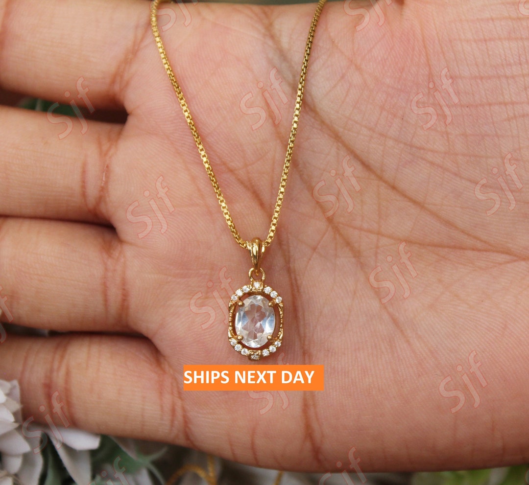 Oval 9 x 7mm Flinders Island White Topaz Necklace ~ Yellow Gold