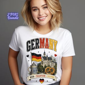 Pode incluir: Uma t-shirt branca com uma estampa gráfica com o texto GERMANY em preto, vermelho e amarelo. O design inclui uma bandeira alemã, um castelo, uma caneca de cerveja e um pretzel. Abaixo, uma faixa exibe o texto BEER TRADITION CULTURE.