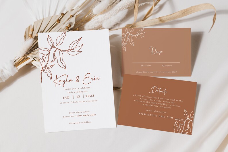 May include: A white wedding invitation with a brown floral design and the text "Kayla & Eric" and "Jan 12 2023". A brown RSVP card with the text "RSVP" and "Details" and a white floral design.