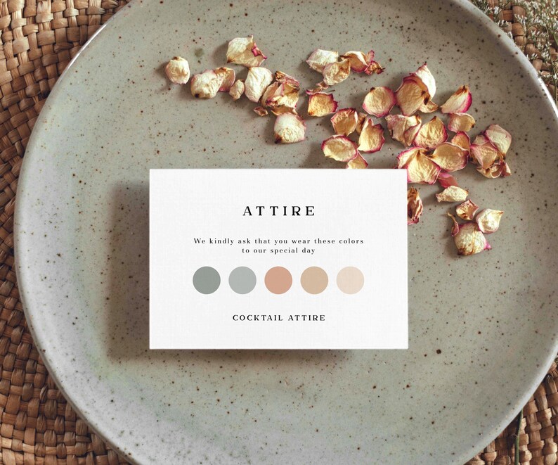 May include: A white card with the word "ATTIRE" in black text. The card also includes the text "We kindly ask that you wear these colors to our special day." and "COCKTAIL ATTIRE". There are five color swatches on the card: two shades of blue, one peach, and two shades of beige.