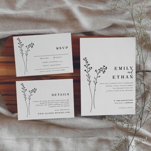 May include: Wedding invitation suite with a minimalist design featuring a floral motif. The invitation card has the names "Emily and Ethan" and details about the wedding ceremony and reception. The RSVP card includes space for guests to indicate their attendance and dietary requirements. The details card provides information about the wedding venue and a special rate for guests.