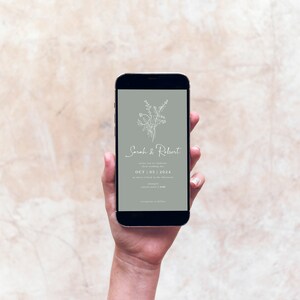 May include: A smartphone displaying a wedding invitation with a floral design and the text "Sarah & Robert" and "OCT. 05. 2024".