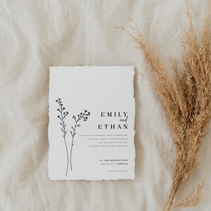 May include: A wedding invitation with a simple design featuring a floral illustration and the names Emily and Ethan. The invitation details the wedding date, time, and location: Saturday, August 22, 2021, at 3:00 PM at St. Regis Monarch Beach in Dana Point, California.