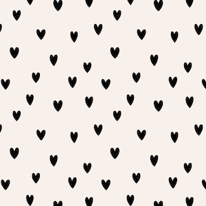 May include: A seamless pattern of black hearts on a light beige background.
