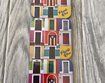 May include: Three square coasters with a colorful collage of doors and windows from Old San Juan, Puerto Rico. Each coaster features the Puerto Rican flag and the text "Puerto Rico" in a yellow circle.