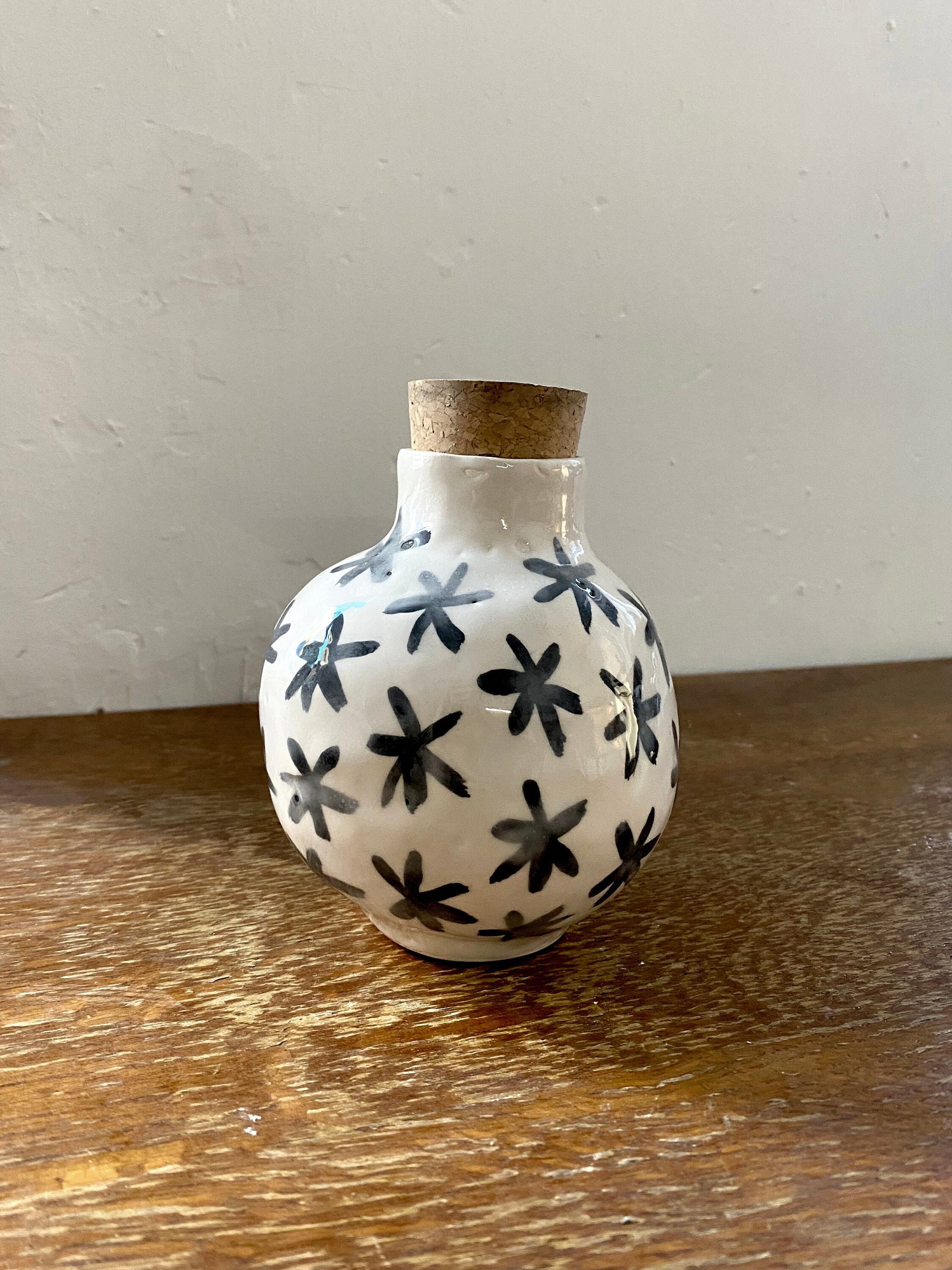 Bouteille d'apothicaire avec Liège et Étoiles