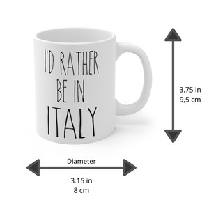 May include: White ceramic mug with black text that reads "I'd rather be in Italy". The mug is 3.75 inches tall and 3.15 inches in diameter.