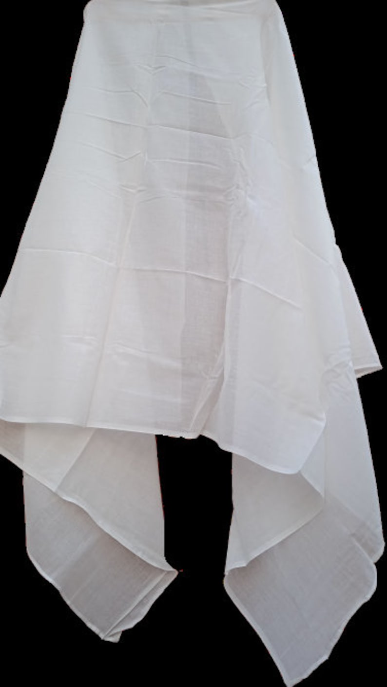 May include: A white sheer scarf with a smooth texture. The scarf is folded in half and draped over a surface.