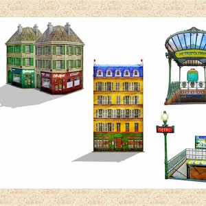 May include: A watercolor illustration of Parisian buildings and metro entrances. The illustration features a yellow building with blue accents, a green building with red accents, a green and white metro entrance with the word "METROPOLITAIN" and a green metro entrance with the word "METRO".