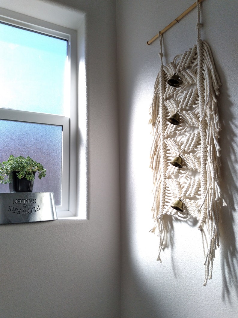 Elegant modern designed macrame wall hanging. Unique handmade macrame tapestry for your home. Natural color for home interior decor.