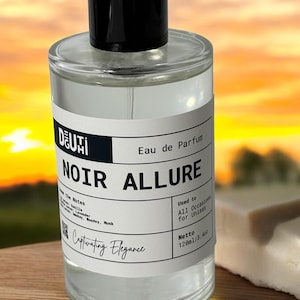 May include: A clear glass perfume bottle with a black cap, labeled "NOIR ALLURE" and "Eau de Parfum." The label includes the text "Used to All Occasions for Unisex" and "Captivating Elegance." The bottle contains 120ml/3.4oz of perfume.