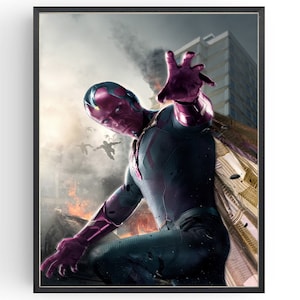 May include: Framed print featuring a superhero in a dynamic pose, with a purple face and metallic accents on a dark suit. The background shows a cityscape with smoke and debris, suggesting an action scene.
