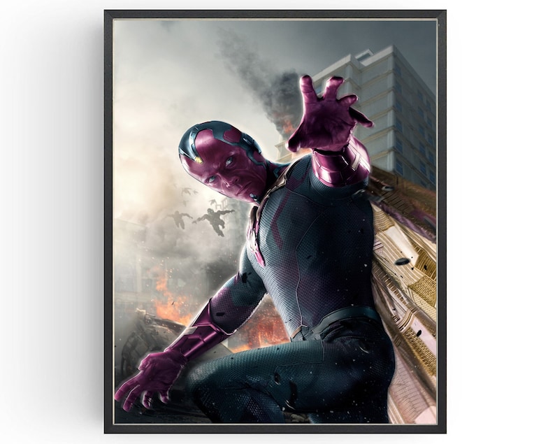 May include: Framed print featuring a superhero in a dynamic pose, with a purple face and metallic accents on a dark suit. The background shows a cityscape with smoke and debris, suggesting an action scene.
