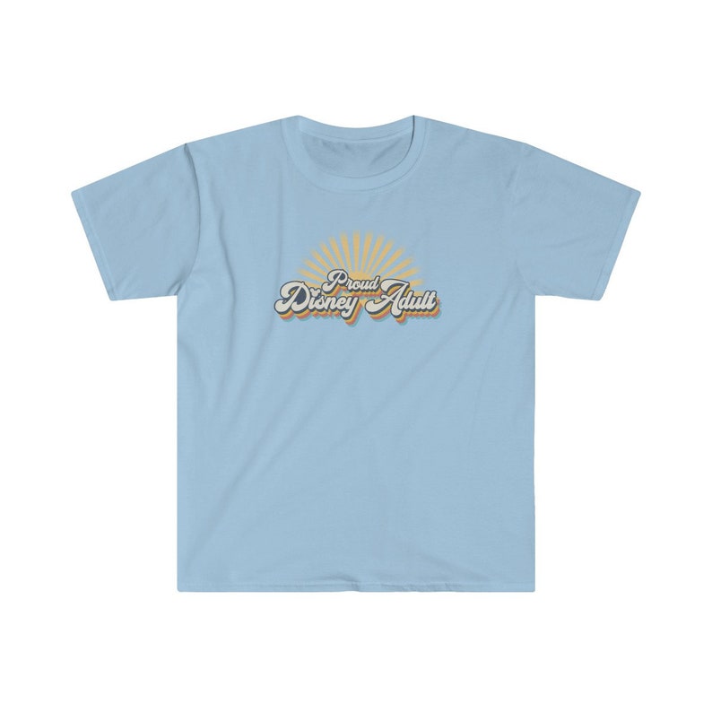 May include: Light blue t-shirt with a retro-style graphic that says "Proud Disney Adult" with a sunburst behind the text.